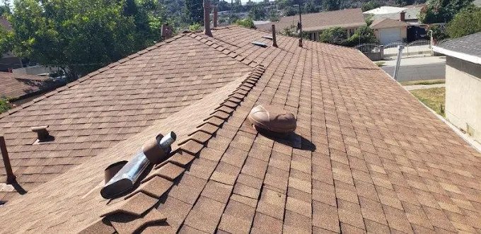 New shingle roof with ridge caps