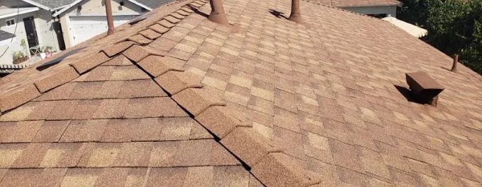 New tan shingle roof